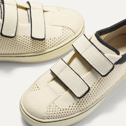 Close up of the vamp of The Kids Strap Sneaker in Chess Open-Knit.