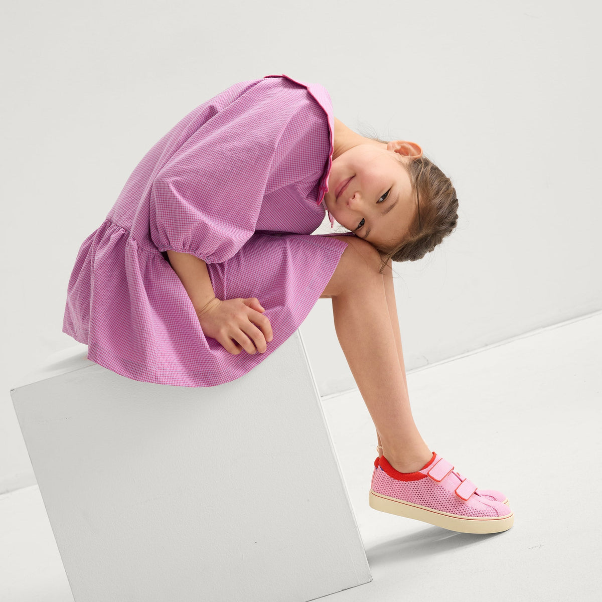 model | Alternate image of a child modeling The Kids Strap Sneaker in Tutu Open-Knit.